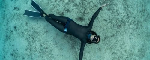 freediver girl in the sea.